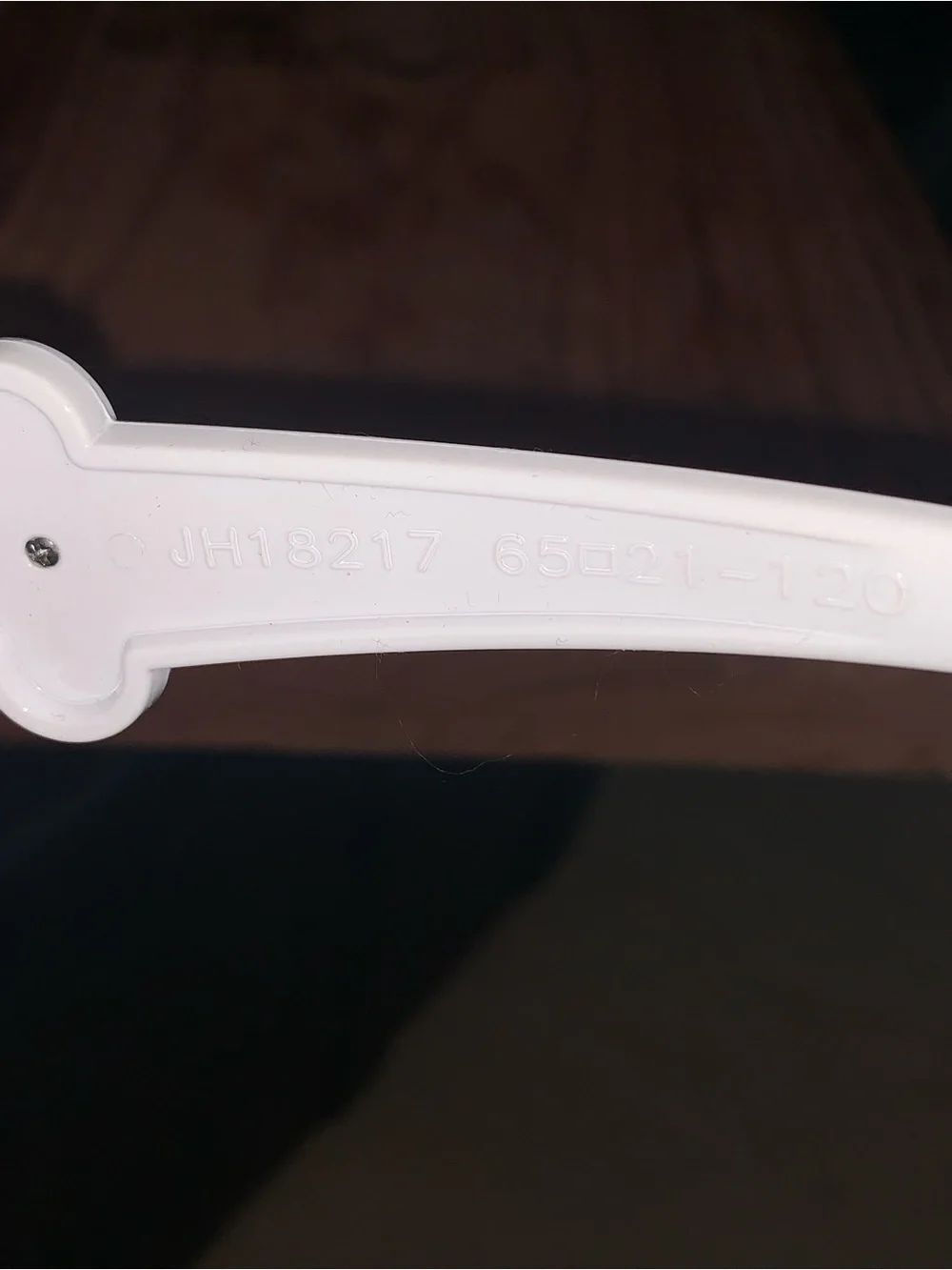 White Oval Sunglasses with Light Blue Lenses